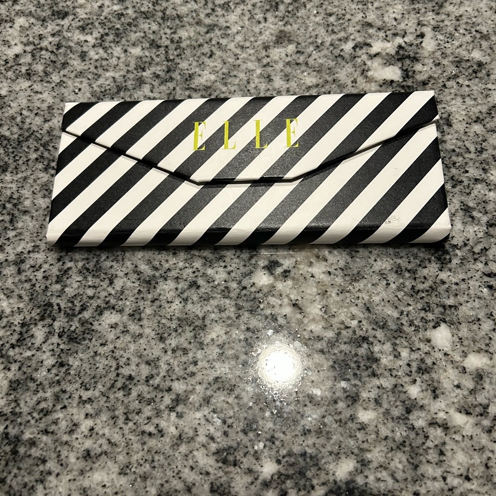 Elle Black and White Diagonal Stripe Trifold Eyeglass Case with Gold Logo
